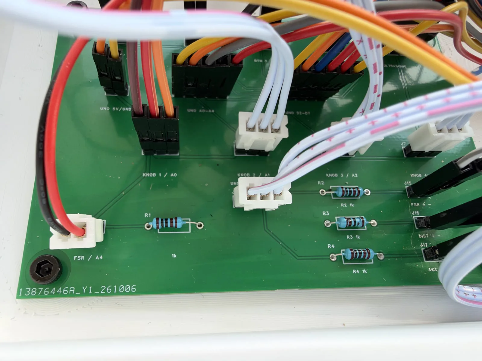 Close view of the assembled carrier board, resistors and connectors.